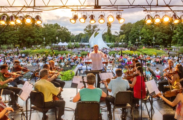 Promusica Chamber Orchestra performs at Franklin Park, Stephen Canneto's NavStar in the background, Columbus Ohio