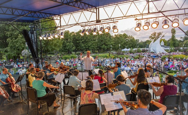 Promusica Chamber Orchestra performs at Franklin Park, Stephen Canneto's NavStar in the background, Columbus Ohio
